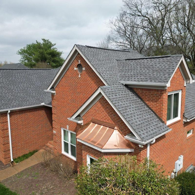 Asphalt shingle roof with hail and wind damage in Brentwood