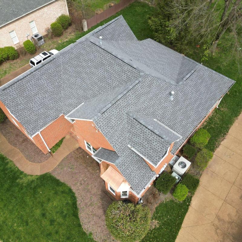 Roof shingles with hail and wind damage in Brentwood