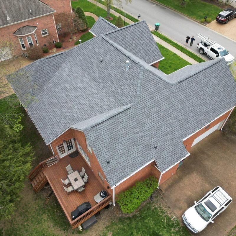 Asphalt shingle roof with hail and wind damage inspection
