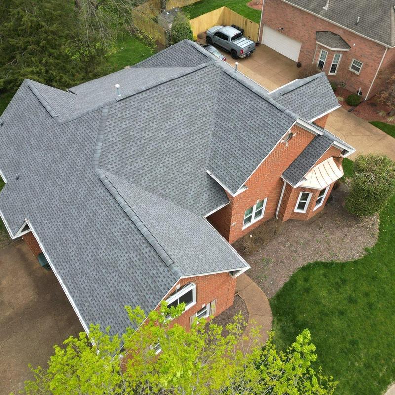 Asphalt shingle roof with hail and wind damage inspection