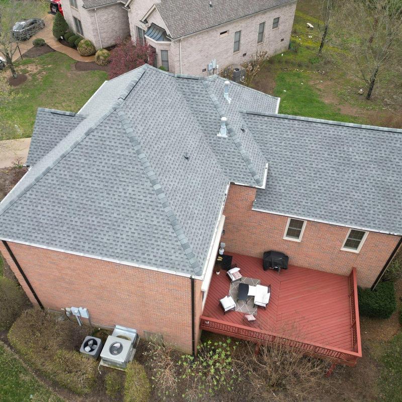 Roof shingles with hail damage and granule loss