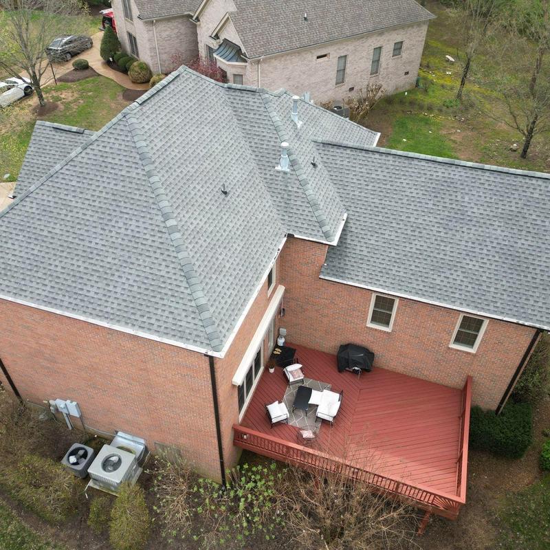 Asphalt shingle roof with ventilation and flashing repairs