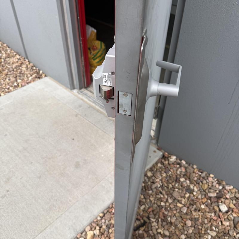 Exit device with outside lever trim and new fasteners