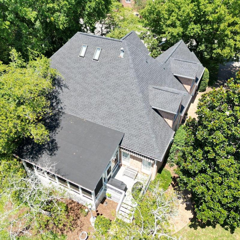 Architectural shingle roof with skylights and ventilation