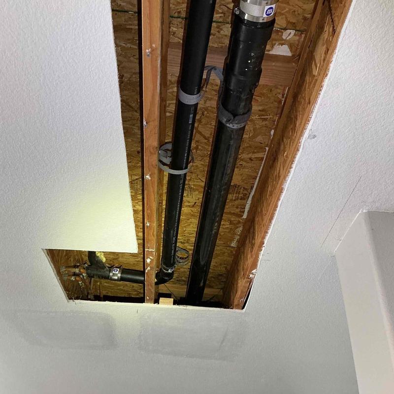 Toilet and shower drain pipe replacement in ceiling cavity