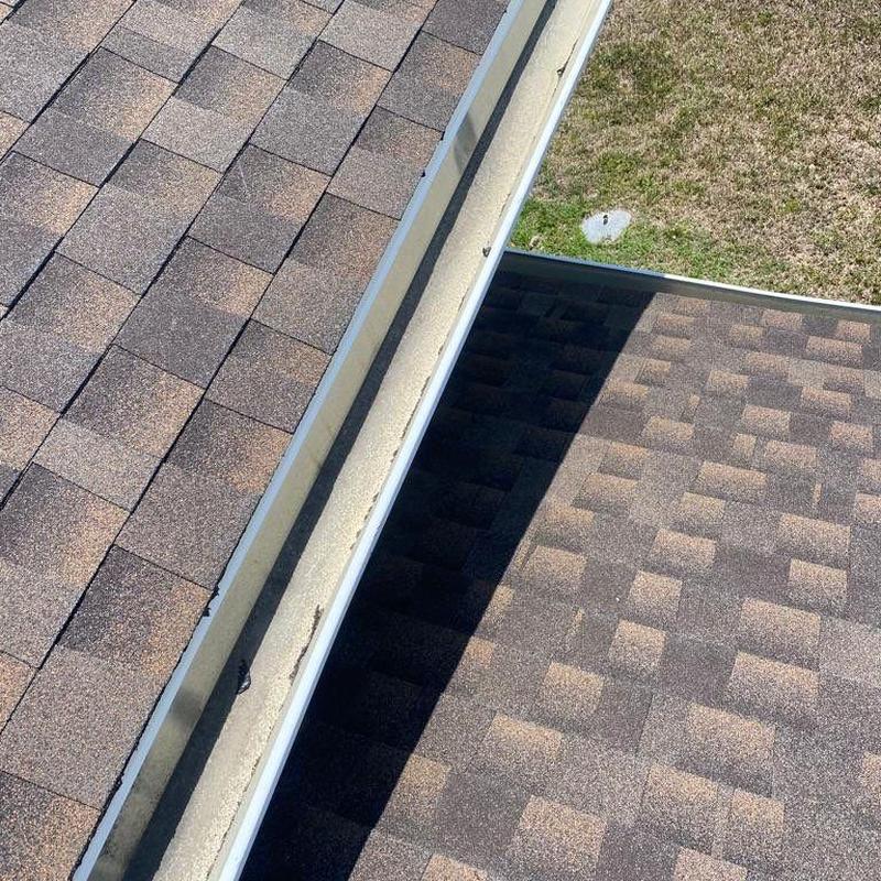 Shingle roof and gutter edge inspection from above