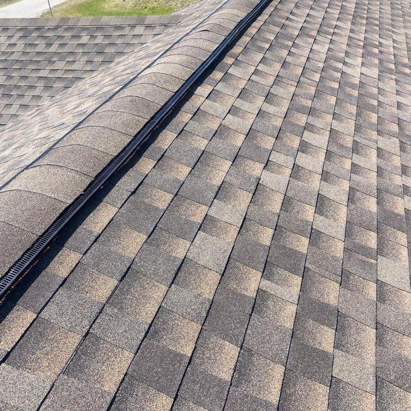 Shingle roof with ridge vent and gutter guard Cape Coral