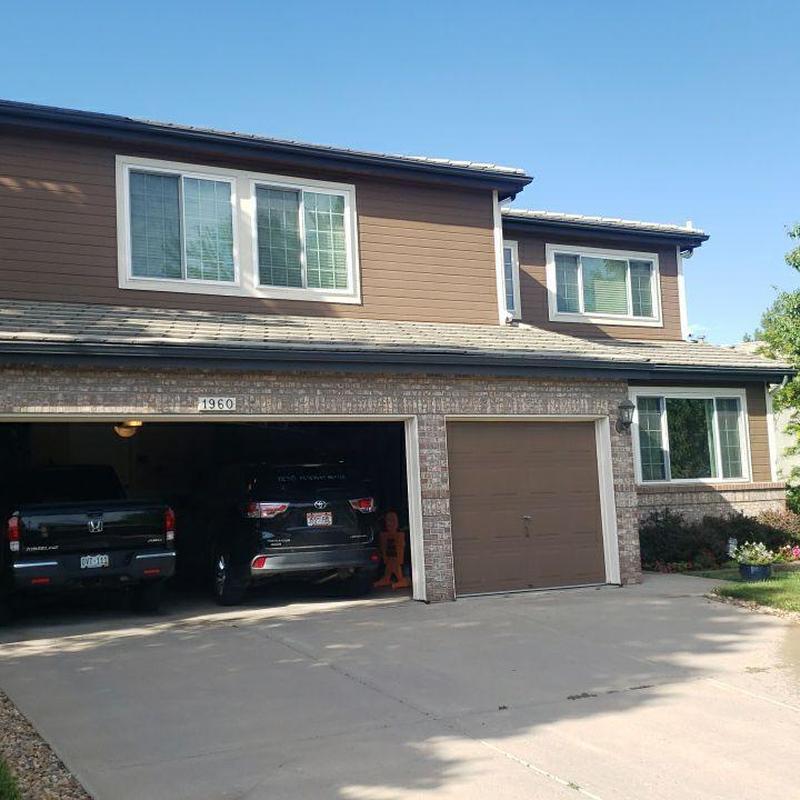 Tile roof and gutter corner inspection at residence