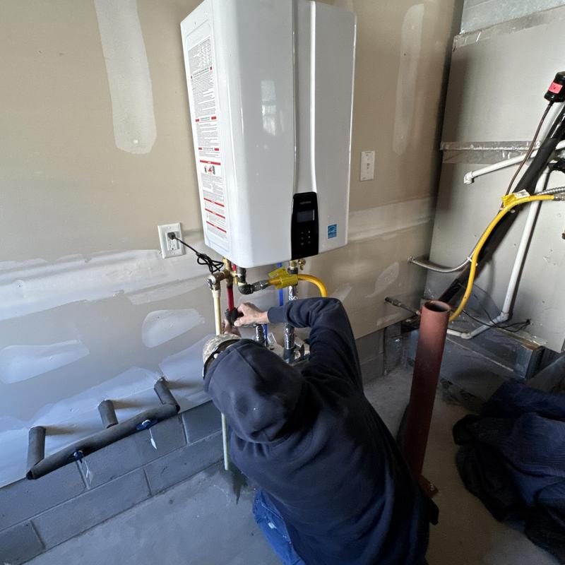 Navien tankless water heater installation in basement