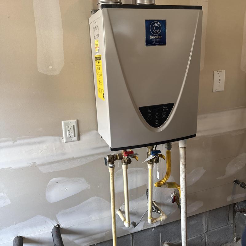 Navien tankless water heater installation in garage
