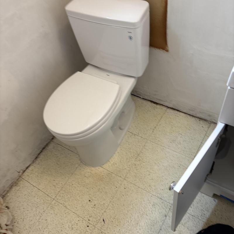 Toilet installation with new water supply line and angle stop
