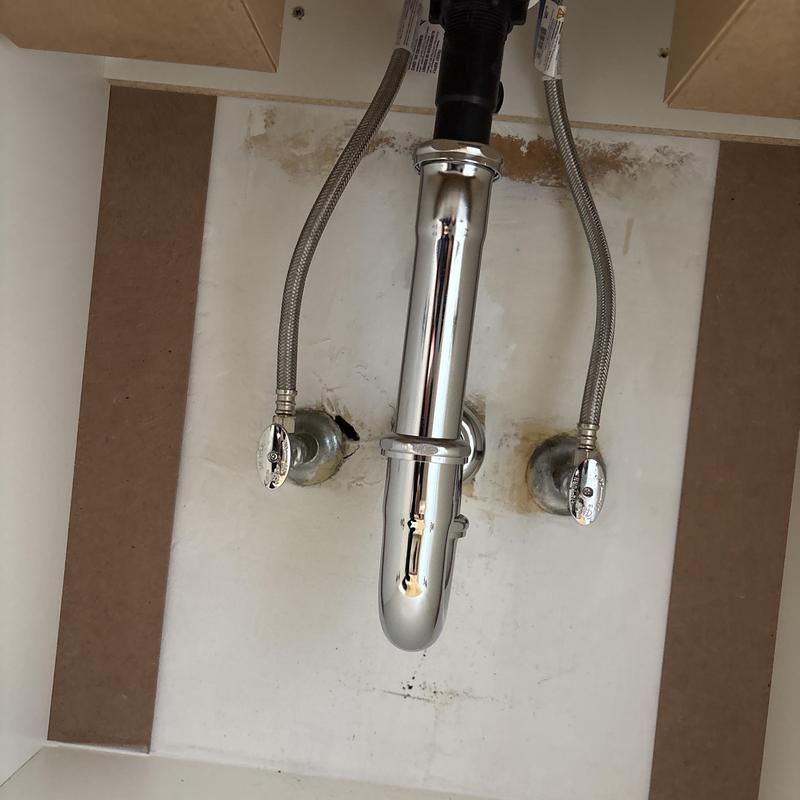 Sink P-trap and supply lines installation under basin