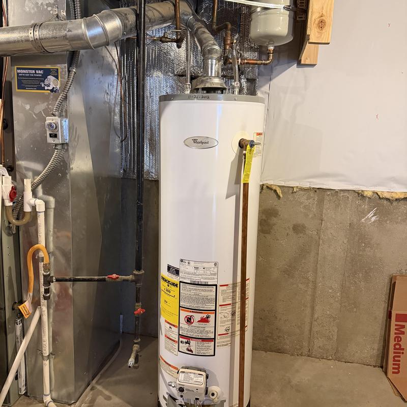 Water heater with new vent pipe installation
