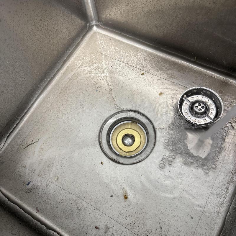 Commercial floor drain with water flow test