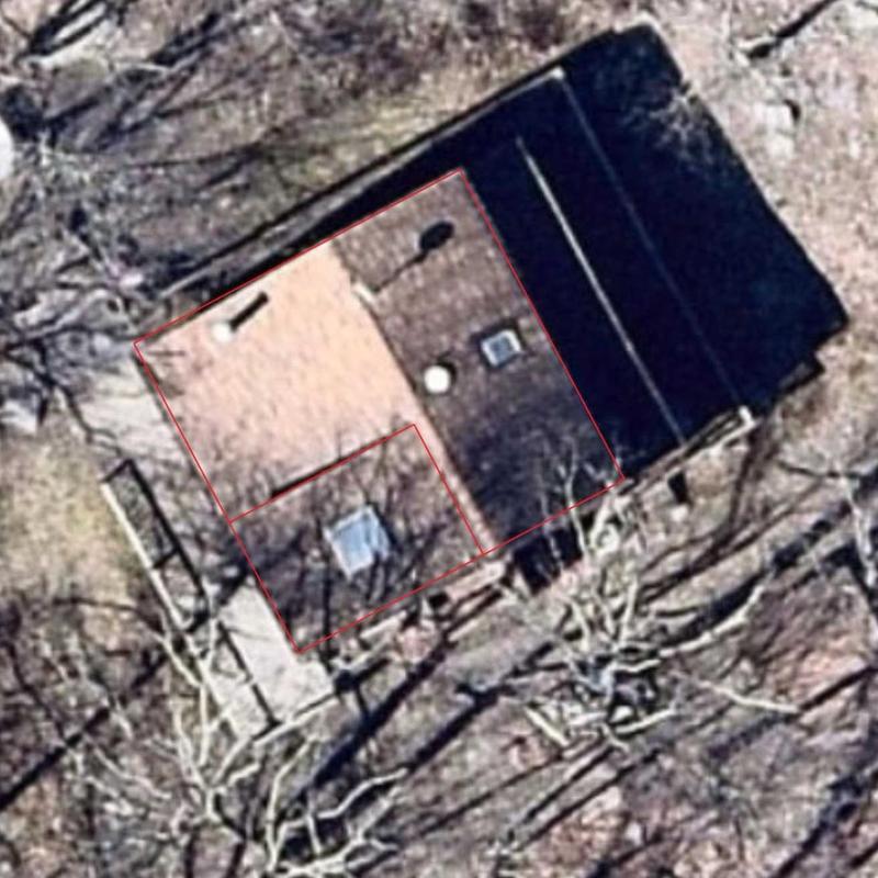 Flat roof aerial inspection with marked roof area