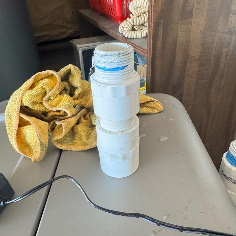 PVC bypass valve connection with thread sealant applied