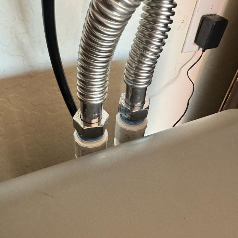 Rheem water softener supply line connections with sealant