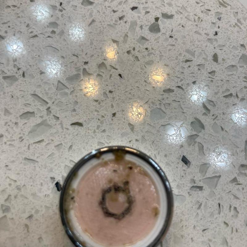 Faucet aerator with mineral buildup on countertop Faucet aerator with mineral buildup on countertop