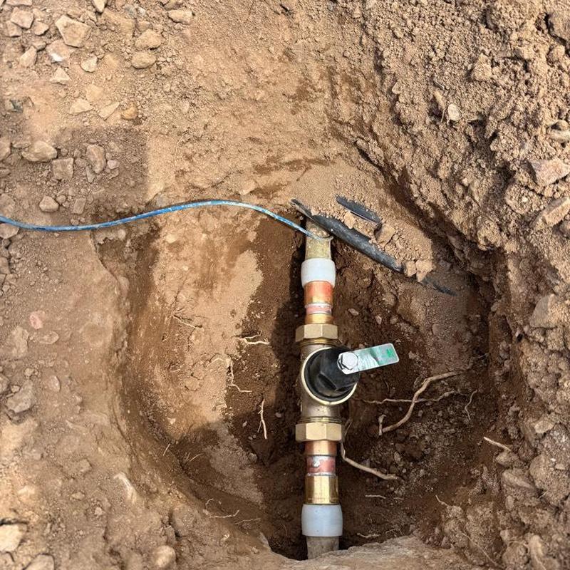 Pressure regulator valve installation near water meter box