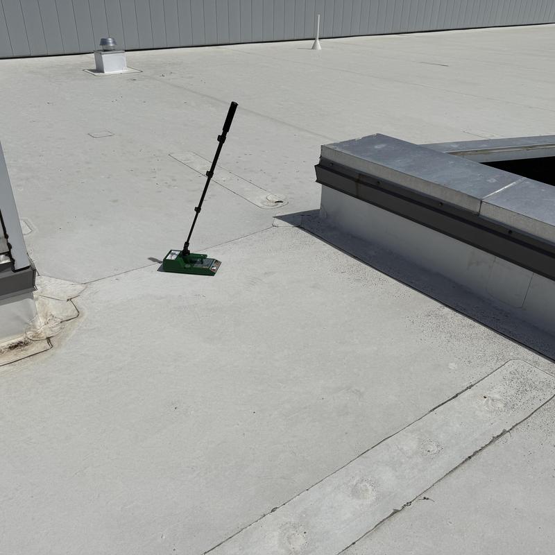TPO roofing membrane inspection near roof penetrations