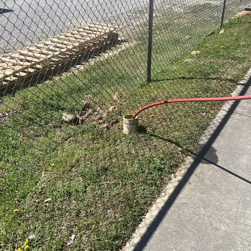 Main sewer line clean out with jetting hose