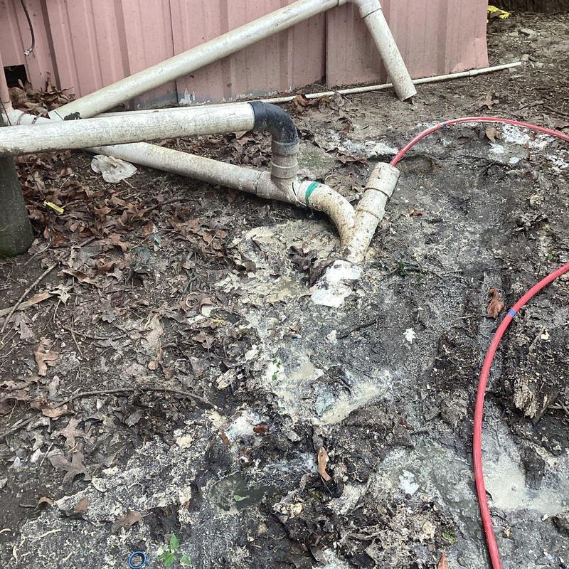 6-inch drain line with grease buildup and jetting hose