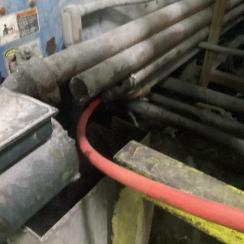 3-inch hot water line with cleaning hose inserted