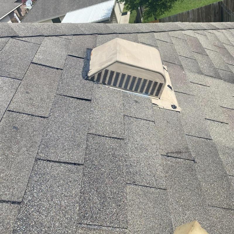 Roof vent flashing and shingle repair on asphalt roof