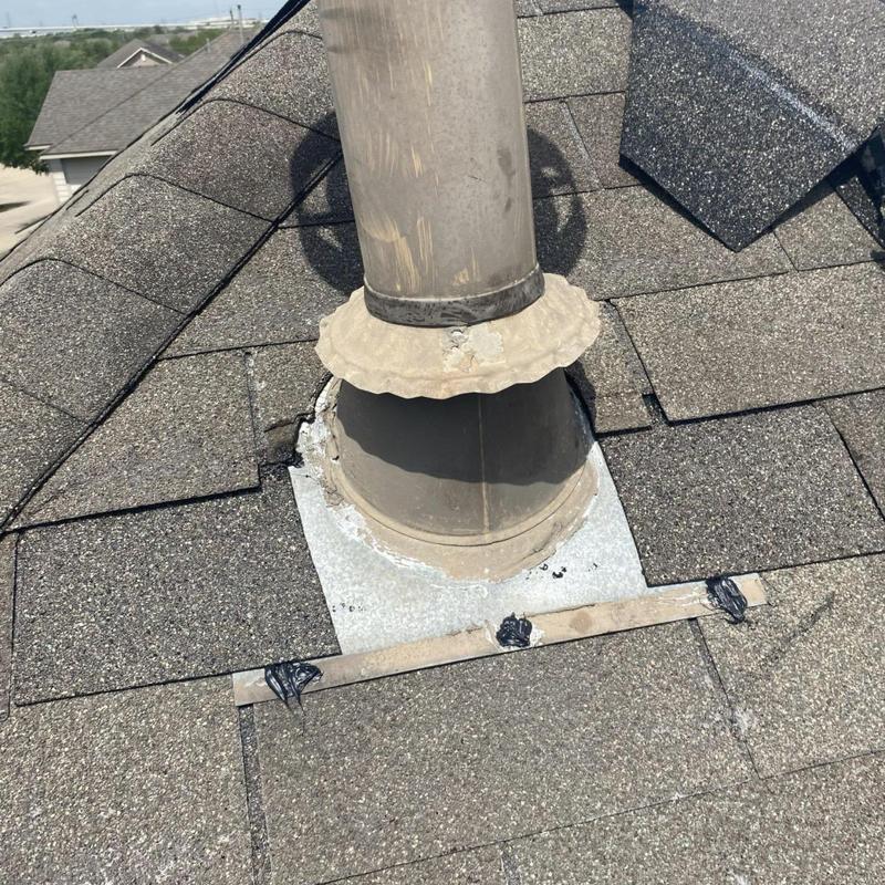 Pipe jack flashing and surrounding shingle repair on roof
