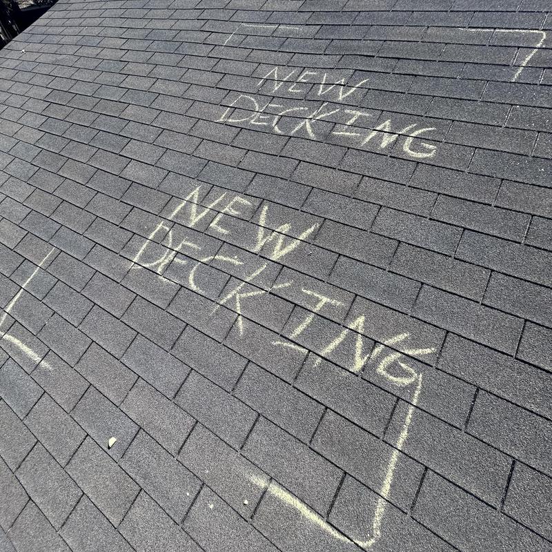 Roof decking areas marked for new installation