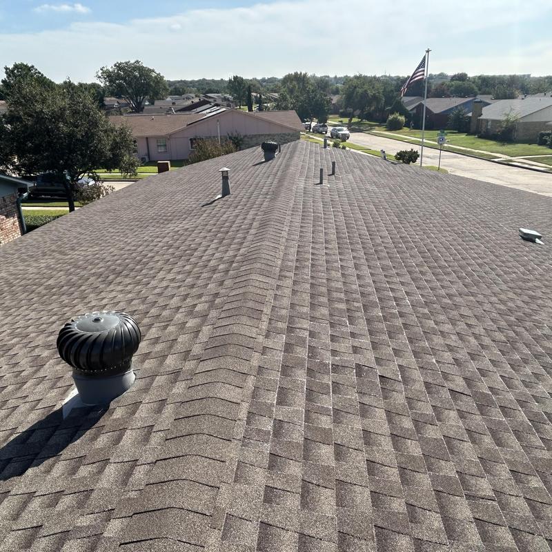 Asphalt shingle roof with ventilation turbines in Fort Worth