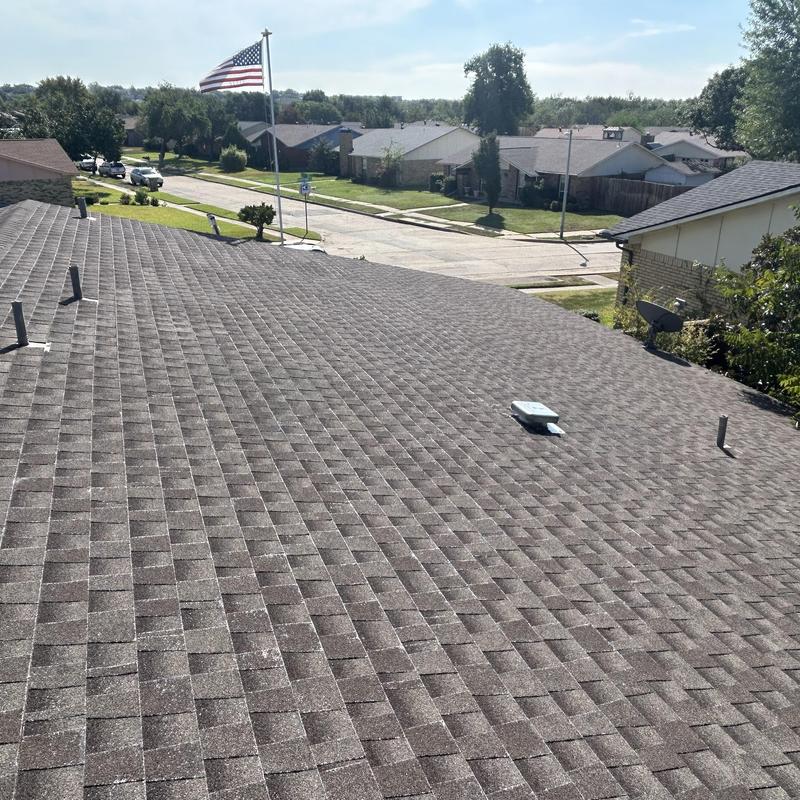 Asphalt shingle roof with ventilation pipes in Fort Worth