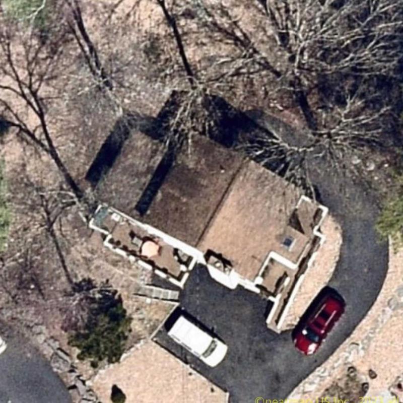 Roof shingles and structure viewed from above during inspection