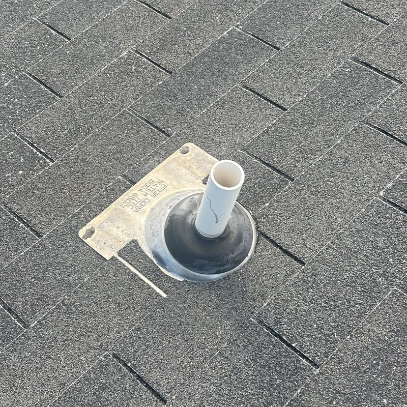 Vent pipe flashing on asphalt shingle roof