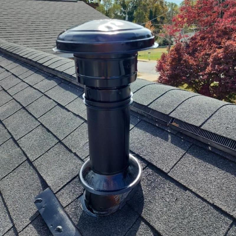Roof pipe vent flashing with seal on shingle roof