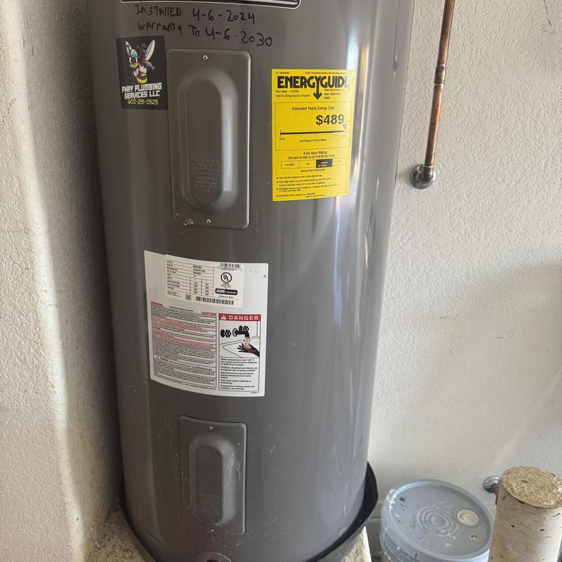 Water heater with energy guide label and warning signs Water heater with energy guide label and warning signs