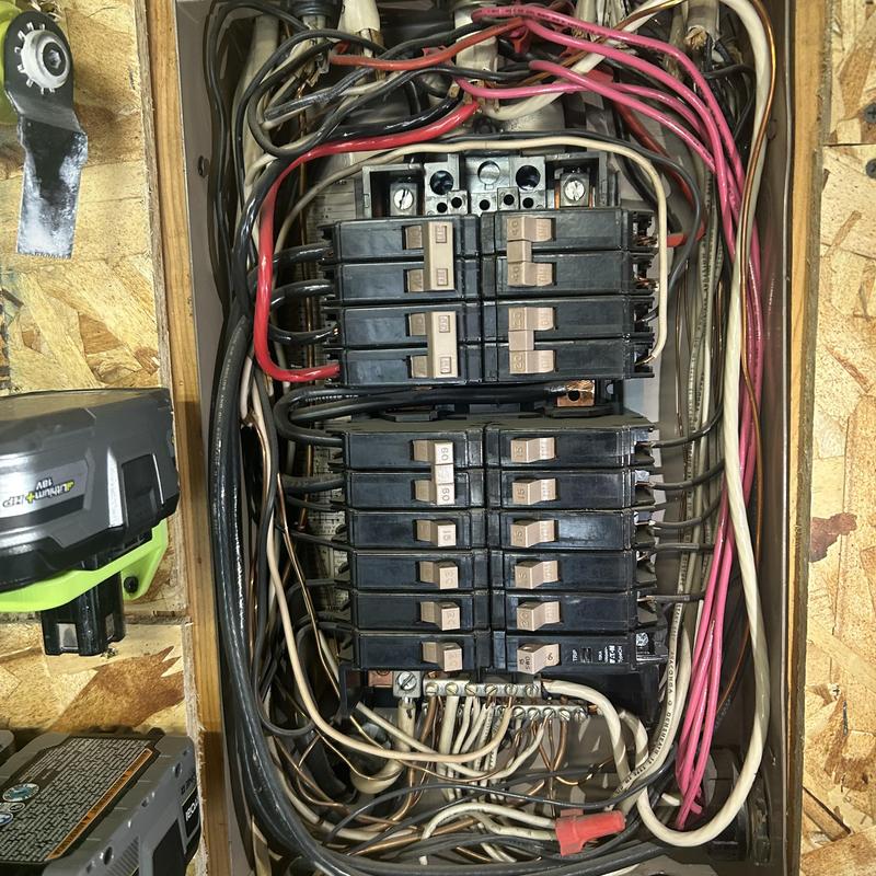 Split bus electrical panel with circuit breakers Split bus electrical panel with circuit breakers