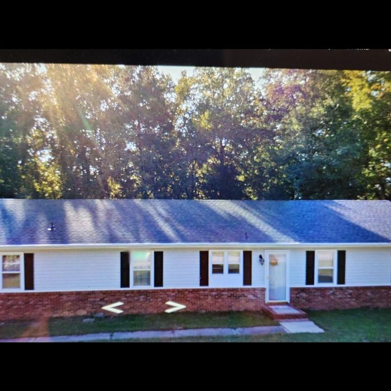 Owens Corning shingle roof with replaced dry rot wood