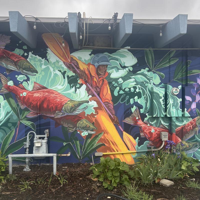 Gas meter and piping with colorful mural background Gas meter and piping with colorful mural background