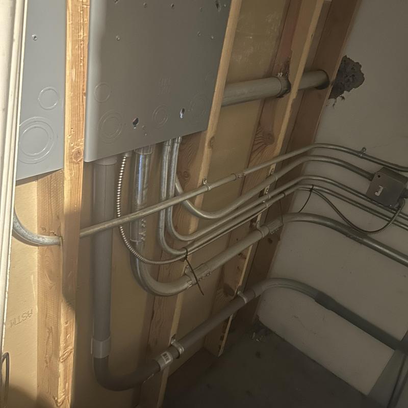 Electrical conduit installation inside wall framing Electrical conduit installation inside wall framing