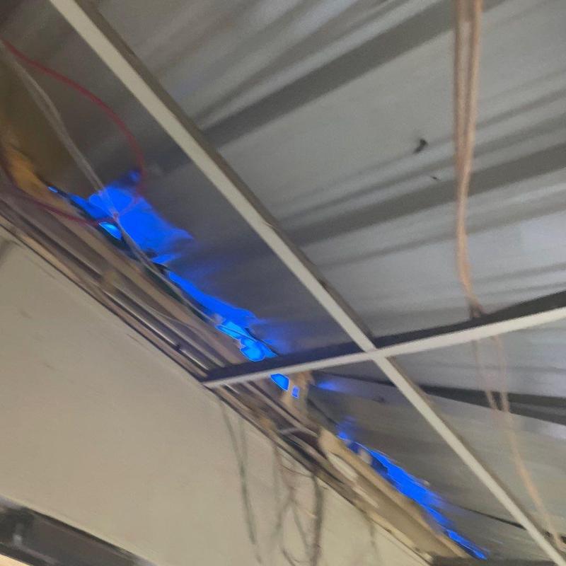 Metal panel roof with severe hurricane damage and leaks