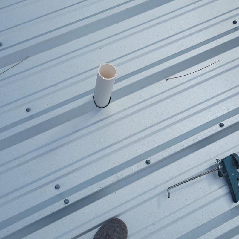 Metal roof plumbing vent without seal or boot installed