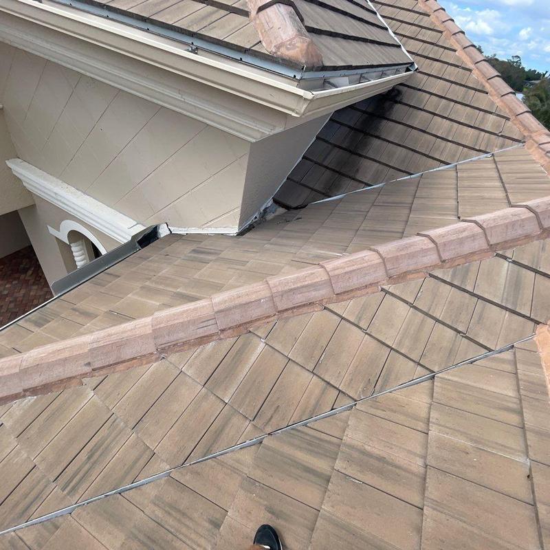 Concrete tile roof with ridge and valley flashing