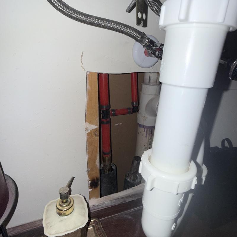 Hot water pipes behind master bathroom wall opening Hot water pipes behind master bathroom wall opening