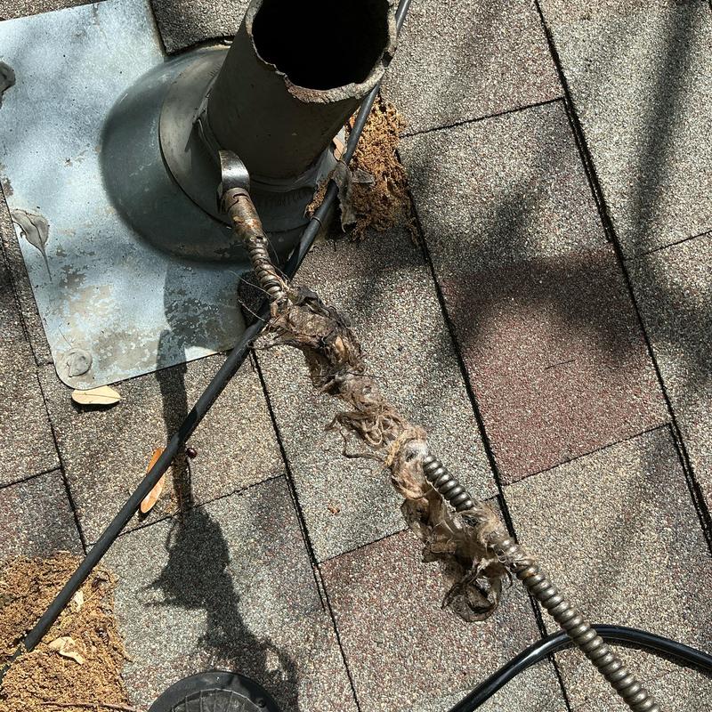 Roof vent mainline clog with removed debris Roof vent mainline clog with removed debris