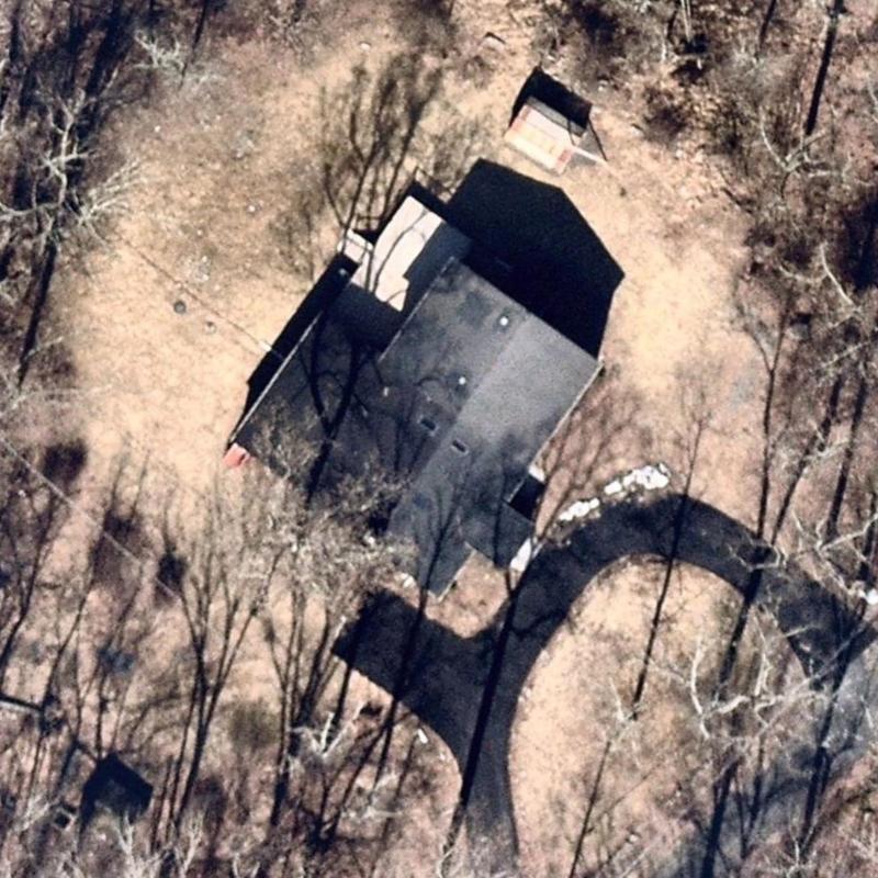 Roof shingles inspection aerial view of residential home