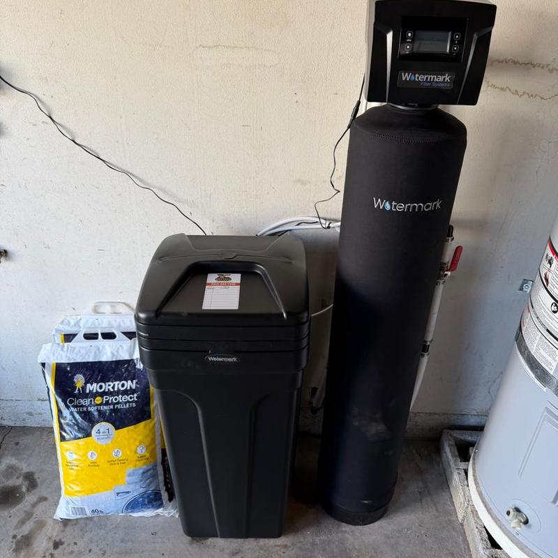 Watermark water softener system with pellets nearby