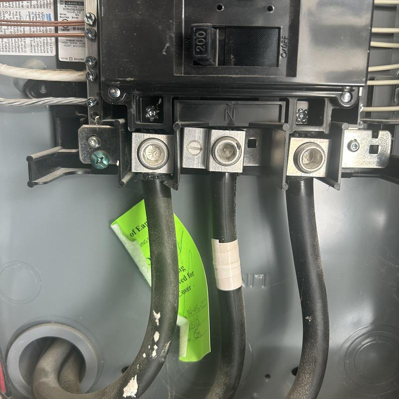 Electrical panel main breaker with cables connected Electrical panel main breaker with cables connected