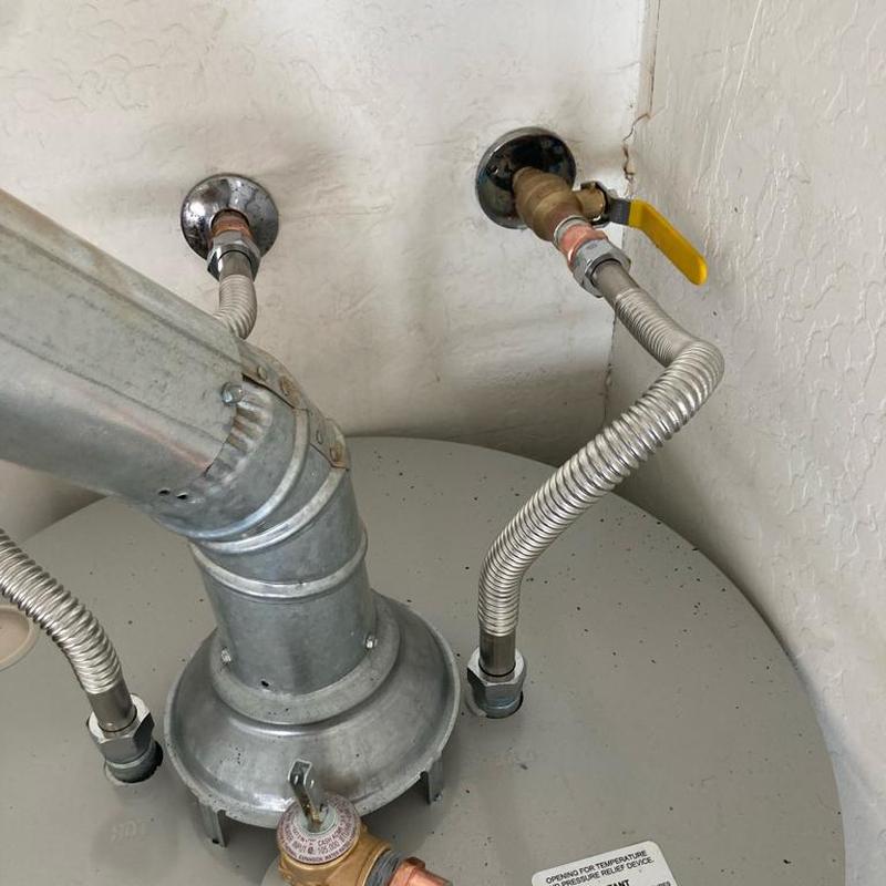 Gas water heater with new ball valve and flex lines