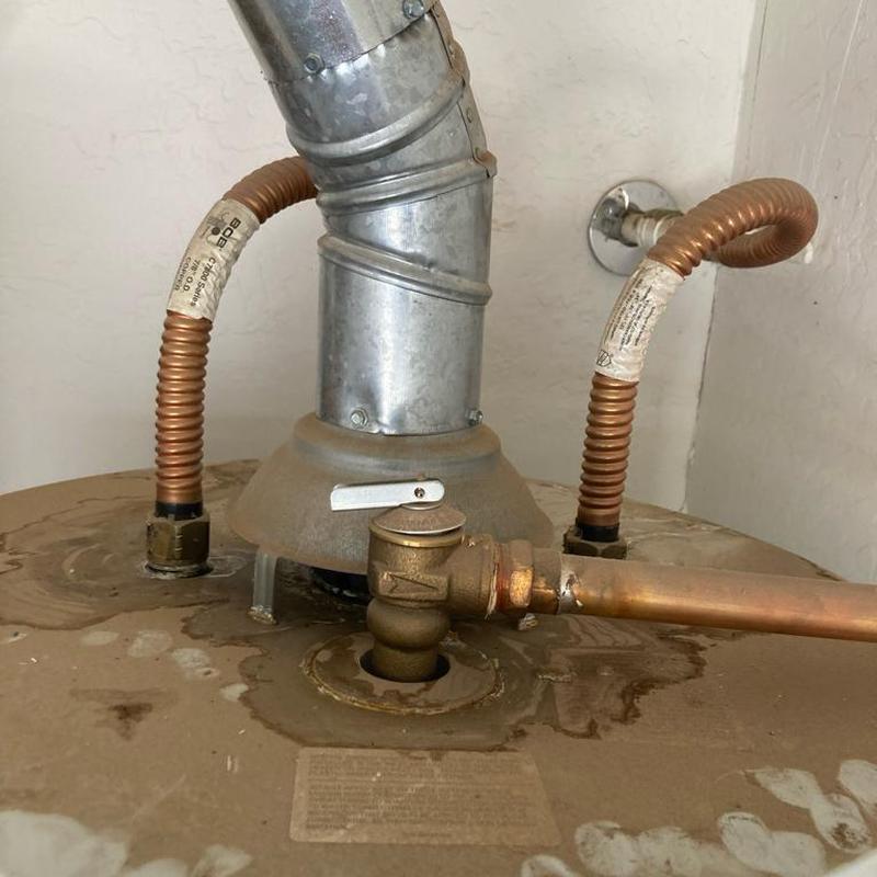 Gas water heater with old leaking valve and flex lines